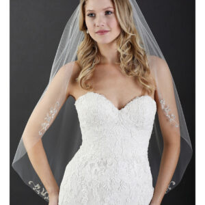 V7470 1-tier cut edge fingertip veil with embroidered scroll motifs Grace your walk down the aisle with a beautifully embroidered veil